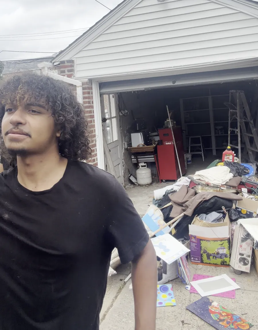 Pile of junk pulled from a garage during a cleanout